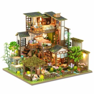 A beautifully crafted miniature house kit showcasing intricate details.