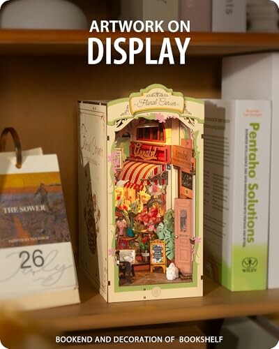 Bookend with floral shop design on a bookshelf.