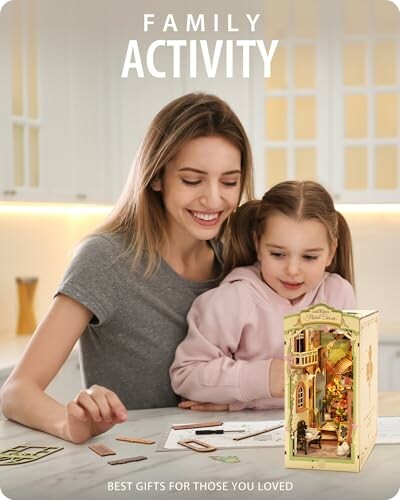Mother and daughter enjoying a dollhouse kit together.