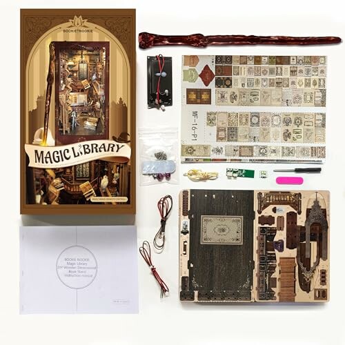 Magic library kit components laid out, including box, wand, and various paper items.
