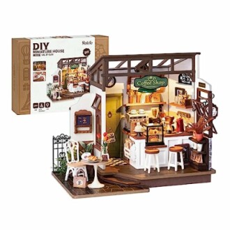 DIY miniature coffee shop model with detailed interior.