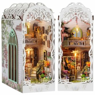 Intricate miniature dollhouse kit with detailed interior design.