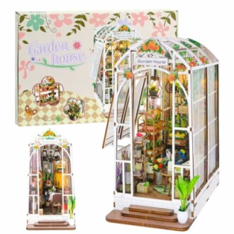 Miniature garden house kit with detailed interior and packaging.