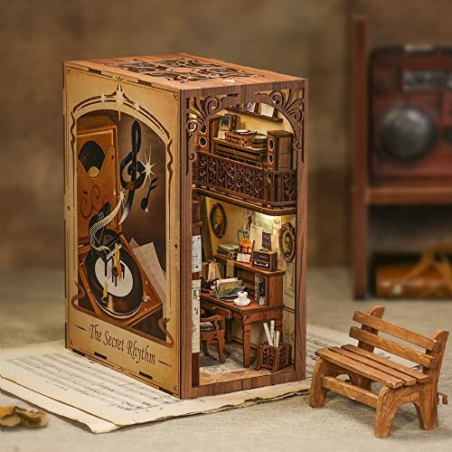 Miniature diorama of a music-themed room with intricate details.