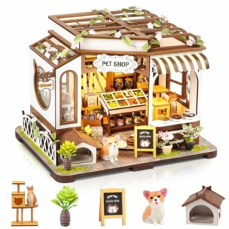 Miniature pet shop diorama with small furniture and decorations.