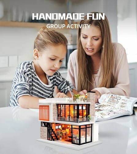 Mother and daughter assembling a dollhouse together.